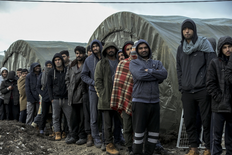 Immigrants struggle to survive at makeshift tents during cold weather in Bosnia and Herzegovina