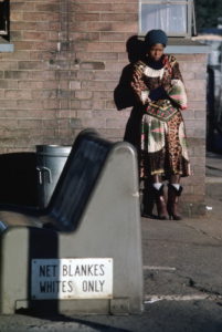 The bench is empty but this young black woman in a Johannesburg railway station would be breaking the law if she sat on it. There has been much talk recently about desegregating racially segregated public facilities. The reality defies the rhetoric. 1/Jan/1982. UN Photo/DB. www.unmultimedia.org/photo/